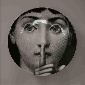 Fornasetti silence wall plate